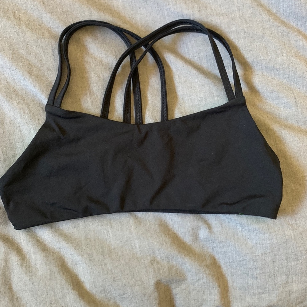 Jolyn Fendrick’s suit swim top